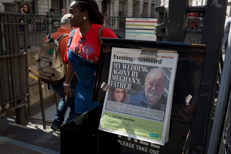 Evening Standard headlines with news of Meghan Markle's father not attending the upcoming royal wedding between the American actor and prince Harry, at Bank underground station in the City of London, the capital's financial district aka the Square Mile, on 15th May 2018, in London, UK.