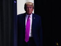 Former President Donald Trump makes his way onto the stage during the Oakland County GOP Lincoln Day Dinner at the Suburban Collection Showplace in Novi, Michigan, on June 25, 2023.