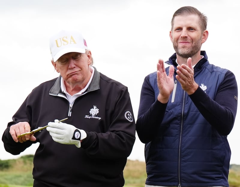 (left to right) Donald Trump Jr, US President Donald Trump and Eric Trump attend the opening of the Trump International Golf Links, the president's new golf course on the Menie Estate in Balmedie, Aberdeenshire. The president is opening up a new course dedicated to his Scottish mother, who grew up on the Isle of Lewis, as part of his five-day private trip to the country. Picture date: Tuesday July 29, 2025. (Photo by Jane Barlow/PA Images via Getty Images)