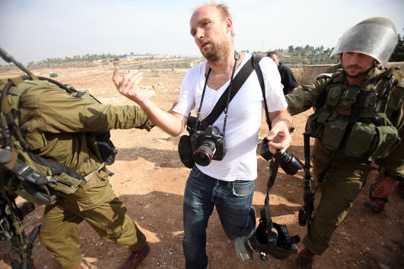 articles/2013/03/18/israel-discourages-journalists-from-visiting-west-bank/journalist-west-bank-openz_hl5sq2