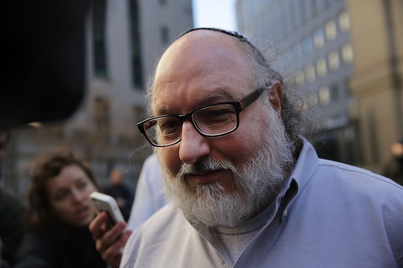 NEW YORK, NY - NOVEMBER 20: Jonathan Pollard, the American convicted of spying for Israel, leaves a New York court house following his release from prison early on Friday after 30 years on November 20, 2015 in New York, New York. Pollard, who was convicted as a Navy intelligence analyst of passing suitcases filled with classified documents to Israeli agents in the mid-1980s, won't be allowed by the Obama administration to leave the country and move to Israel at this time. (Photo by Spencer Platt/Getty Images)