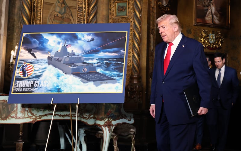 U.S. President Donald Trump arrives to announce the creation of the “Trump-class” battleship during a statement to the media at Trump’s Mar-a-Lago estate on December 22, 2025 in Palm Beach, Florida.