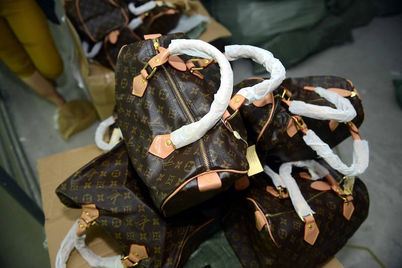 articles/2014/06/25/museum-of-fakes-for-a-city-of-fakes/140620-oconnor-counterfeit-tease_cwe6ii