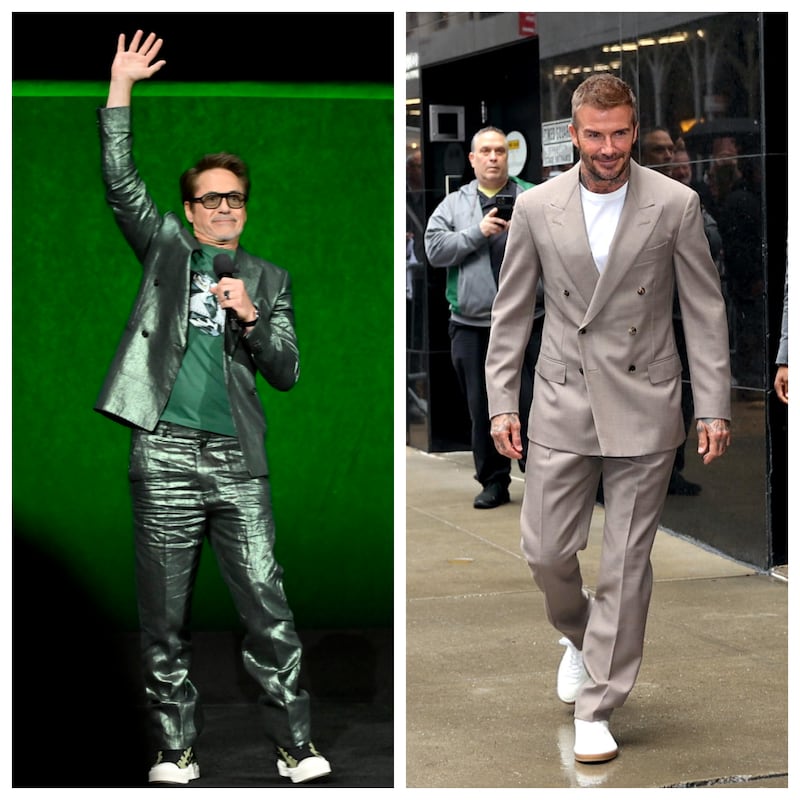 Robert Downey Jr. speaks during CinemaCon in 2026, wearing a metallic green suit and sneakers, and David Beckham arrives at “Good Morning America” in 2024 wearing a tan suit with white sneakers.