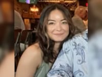 Mica Miller smiles in a family photo.
