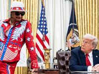 Washington, DC - March 31 : President Donald J Trump, with singer Kid Rock by his side, speaks to reporters and signs an executive order about enforcement in the concert and entertainment industry, in the Oval Office at the White House on Monday, March 31, 2025 in Washington, DC. (Photo by Jabin Botsford/The Washington Post via Getty Images)