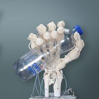 Image montage of the soft robotic hand holding objects.