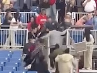 A graduation ceremony in Connecticut briefly ground to a halt after a crowd fight led to arrests.