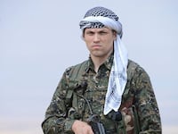 articles/2014/10/03/the-wisconsin-boy-fighting-isis-in-syria/141002-siegel-fighter-tease_djwxi5