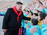 Kim Jong Un meets representatives of the Korean Children's Union in Pyongyang, North Korea, in this photo released on Jan. 1, 2023.