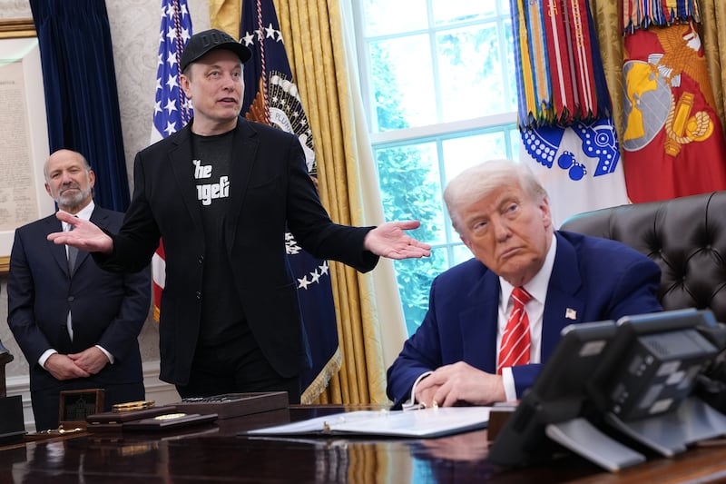 Tesla CEO Elon Musk speaks alongside U.S. President Donald Trump to reporters in the Oval Office of the White House on May 30, 2025 in Washington, DC. Musk, who served as an adviser to Trump and led the Department of Government Efficiency, announced he would leave his role in the Trump administration to refocus on his businesses.