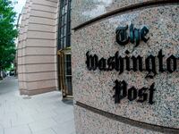 The Washington Post logo outside its building.