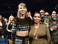 Photo of Taylor Swift and Kim Kardashian West attending the 2015 MTV Video Music Awards