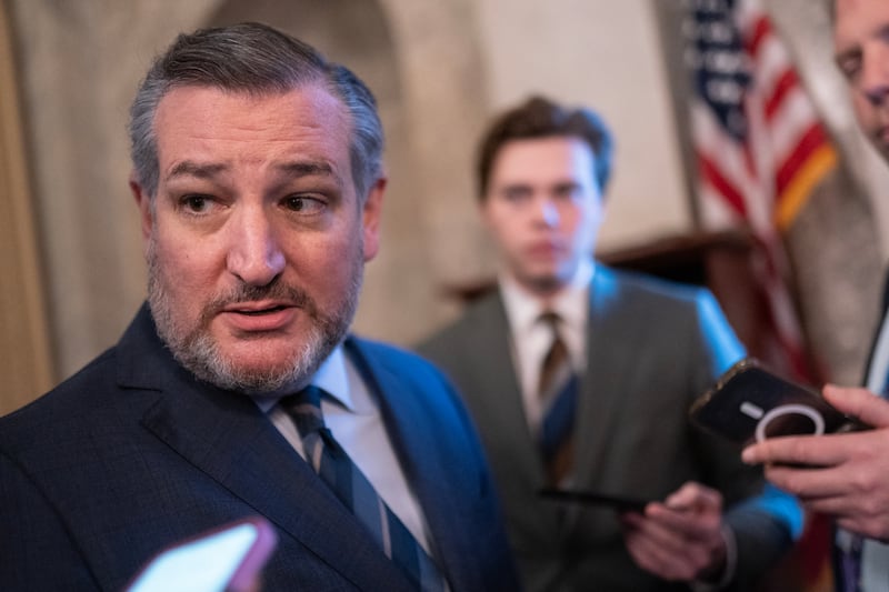 Sen. Ted Cruz (R-TX) talks with members of the media in the Capitol.