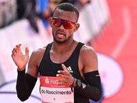 HAMBURG, GERMANY - APRIL 23: Daniel do Nascimento of Brazil crosses the finish line at the Haspa Marathon Hamburg 2023 on April 23, 2023 in Hamburg, Germany. (Photo by Stuart Franklin/Getty Images for adidas)