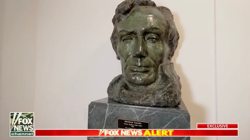 A sculpture of Abraham Lincoln salvaged from the rubble of the East Wing.