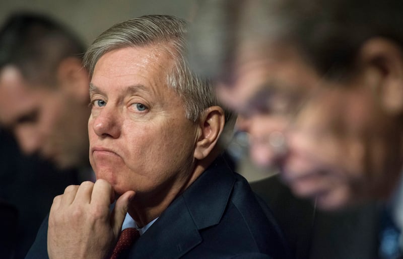 articles/2013/02/11/with-an-eye-on-south-carolina-lindsey-graham-takes-aim-at-chuck-hagel/130210-graham-hagel-murphy-tease_exup4y