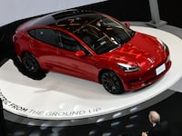 Tesla Model 3 electric car is displayed during the Tesla launch in Bangkok on December 7, 2022.