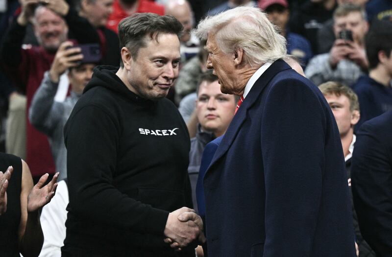 Musk and Trump at the NCAA wrestling competition in March—Musk announced that he would be taking a step back from DOGE last month.