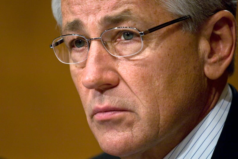 articles/2012/12/21/defending-chuck-hagel/latimer-hagel-pick-tease-embed_dkz1fv
