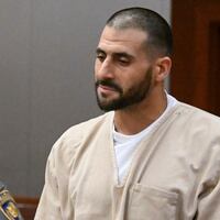 FILE - Dennis Hernandez, the troubled brother of the late New England Patriots tight end Aaron Hernandez, stands with his public defender Sandra Crowell during his arraignment, Aug. 1, 2023, at Connecticut Superior Court in New Britain, Conn.