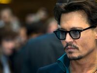 articles/2016/12/02/johnny-depp-s-disturbing-sauvage-campaign-remember-amber-heard/161201-zimmerman-depp-tease_kcyf73