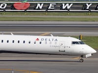 A Delta Airlines jet moves along the runway at Laguardia AIrport on November 10, 2022 in the Queens borough of New York City. The airline industry has rebounded this year and is looking forward to a busy holiday season. (Photo by Bruce Bennett/Getty Images)