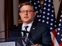 House Speaker Mike Johnson was questioned about Trump voting by mail despite attacking vote-by-mail.