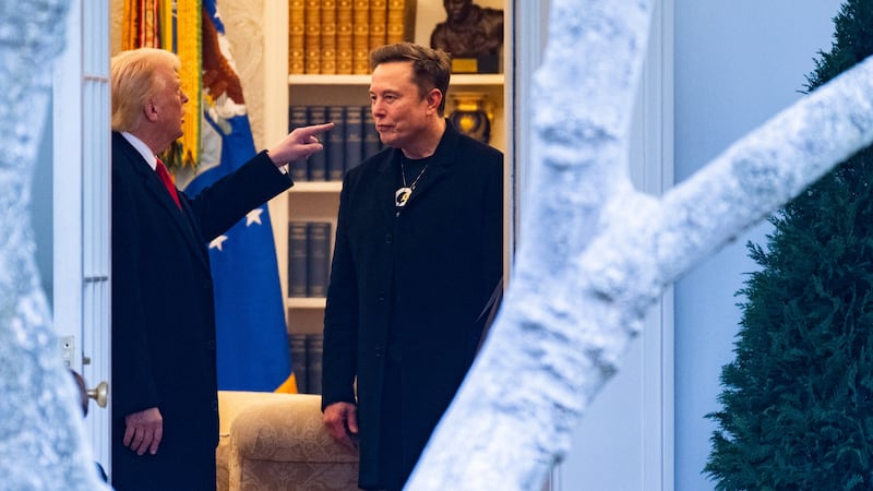 US President Donald Trump and Elon Musk (R) speak before departing the White House on his way to his South Florida home in Mar-a-Lago in Florida on March 14, 2025. Trump is spending the weekend at his Florida Mar-a-Lago resort. (Photo by ROBERTO SCHMIDT / AFP) (Photo by ROBERTO SCHMIDT/AFP via Getty Images)