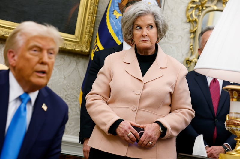 White House Chief of Staff Susie Wiles (C) looks alarmed as President Donald Trump speaks about Gaza.
