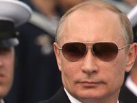 articles/2014/07/30/moscow-remains-defiant-but-feels-the-heat-as-new-sanctions-loom/140729-nemtsova-putin-tease_k43o6p