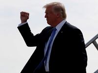 Donald Trump arrives aboard Air Force One at Indianapolis International Airport in Indianapolis, Indiana