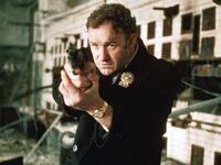 Gene Hackman as Detective Jimmy Doyle points in The French Connection in 1971.