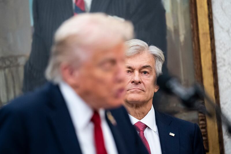 WASHINGTON,DC - SEPTEMBER 30: Centers for Medicare & Medicaid Services Mehmet Oz, speaks with President Donald Trump to announce a deal with Pfizer to lower Medicaid drug prices in the Oval Office at the White House on Tuesday, Sept 30, 2025 in Washington, DC. (Photo by Jabin Botsford/The Washington Post via Getty Images)