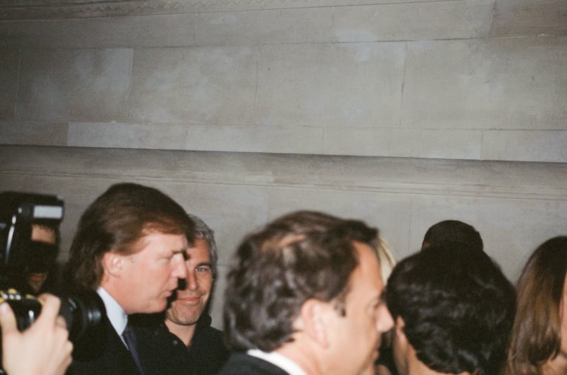 Donald Trump and financier Jeffrey Epstein attend a Victoria's Secret Angels event.