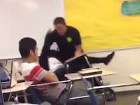 articles/2015/10/26/video-cop-bodyslams-girl-student-who-refuses-to-leave-classroom/151026-police-cheat_vbnlci