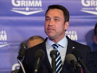 Former U.S. Rep. Michael Grimm speaks during a primary election night event, June 26, 2018 in the Staten Island.