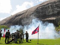 People set off cannons during Confederate Memorial Day at Stone Mountain Park in Stone Mountain, Georgia.
