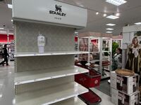 A Los Angeles Target display with only one Stanley Cup left on the shelf.