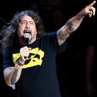 COLUMBIA, MARYLAND - OCTOBER 03: David Grohl (L) of the Foo Fighters performs during Tom Morello's set at the 2026 Power To The People Festival at Merriweather Post Pavilion on October 03, 2026 in Columbia, Maryland. (Photo by Paul Morigi/Getty Images)