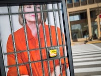 articles/2016/07/26/hillary-for-prison-is-a-big-hit-with-diehard-sanders-fans-at-dnc/160726-swin-hillary-prison-tease_cbdn46
