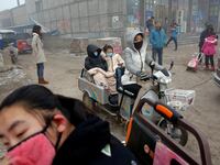 galleries/2014/02/27/smog-vortex-takes-over-beijing-photos/170104-china-smog-01_dth6me