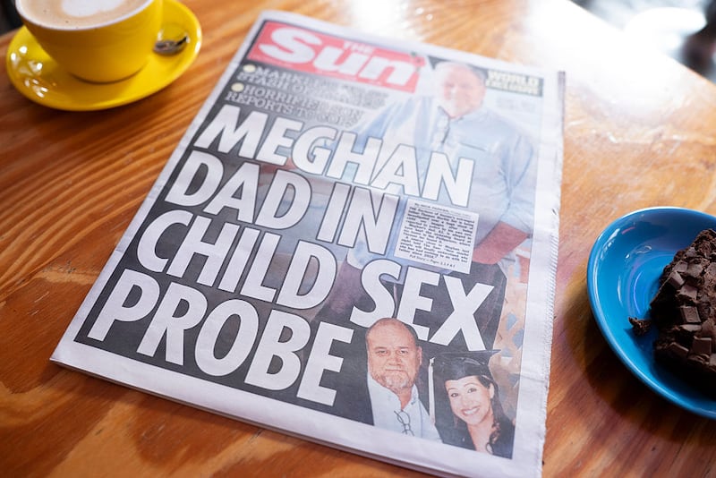 LONDON, ENGLAND - OCTOBER 24: In this illustration, the front page of The Sun newspaper reports allegations against Thomas Markle on October 24, 2026 in London, England. The Sun newspaper has claimed that Thomas Markle, the father of Meghan, Duchess of Sussex, has been accused of possessing indecent images of children. (Photo by Ming Yeung/Getty Images)
