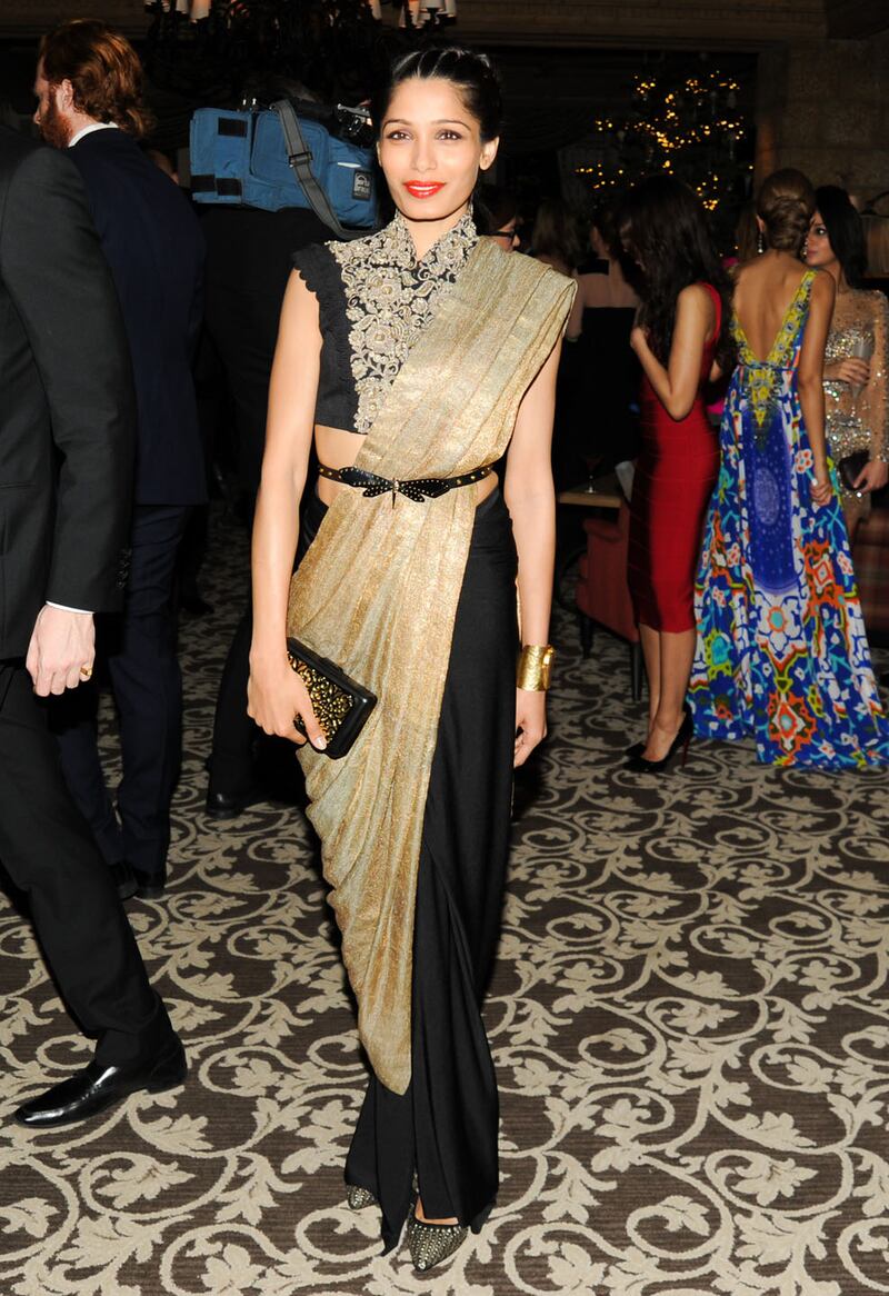 galleries/2013/12/20/from-michelle-obama-to-julia-roberts-best-worst-dressed-of-the-week/131220-best-worst-dressed-pinto_gatarr