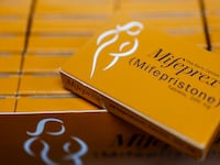 In this photo illustration, packages of Mifepristone tablets are displayed at a family planning clinic on April 13, 2023 in Rockville, Maryland.