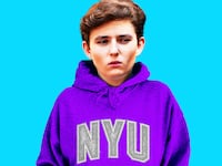 Barron Trump in a NYU sweatshirt