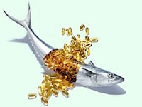 image of thin silver fish broken in half with overflow of yellow pills from stomach oil amarin corp vascepa fda heart disease stroke attack