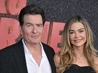 US actor Charlie Sheen and US actress Denise Richards attend the Los Angeles premiere of Netflix's "aka Charlie Sheen" at the Tudum theatre in Hollywood, California, on September 4, 2025. (Photo by LISA O'CONNOR / AFP)