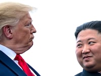 US President Donald Trump and North Korea's leader Kim Jong-un talk before a meeting in the Demilitarized Zone (DMZ)