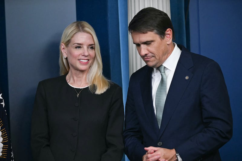 (L-R) Attorney General Pam Bondi and Deputy Attorney General Todd Blanche look on as US President Donald Trump (not on frame) speaks during a news conference in the Brady Briefing Room of the White House on June 27, 2025, in Washington, DC. President Trump claimed a "GIANT WIN" Friday as the US Supreme Court curbed the power of lone federal judges to block executive actions. "GIANT WIN in the United States Supreme Court! Even the Birthright Citizenship Hoax has been, indirectly, hit hard," Trump said on Truth Social. (Photo by ANDREW CABALLERO-REYNOLDS / AFP) (Photo by ANDREW CABALLERO-REYNOLDS/AFP via Getty Images)
